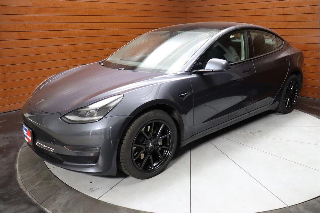used 2023 Tesla Model 3 car, priced at $25,590