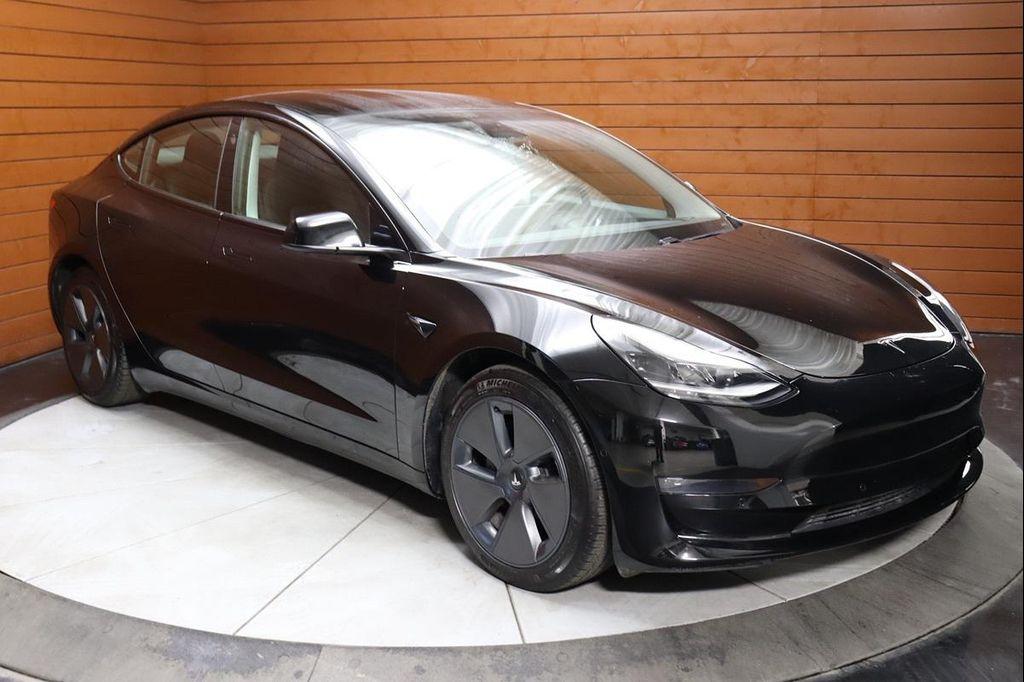 used 2023 Tesla Model 3 car, priced at $21,999
