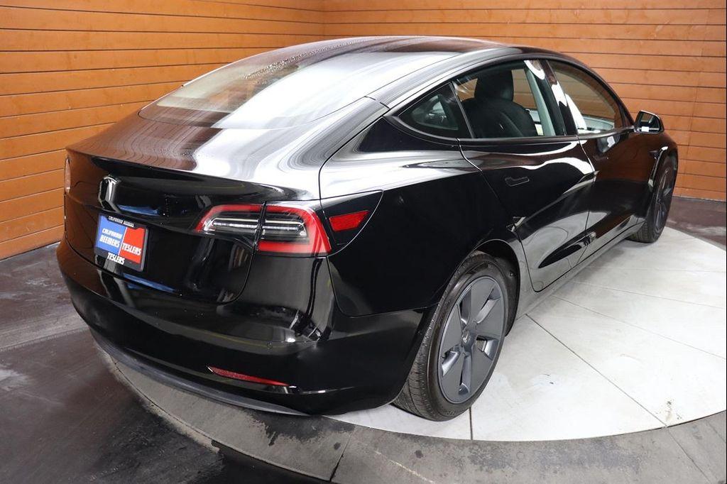 used 2023 Tesla Model 3 car, priced at $21,999