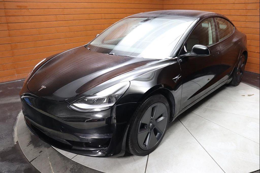 used 2023 Tesla Model 3 car, priced at $21,999