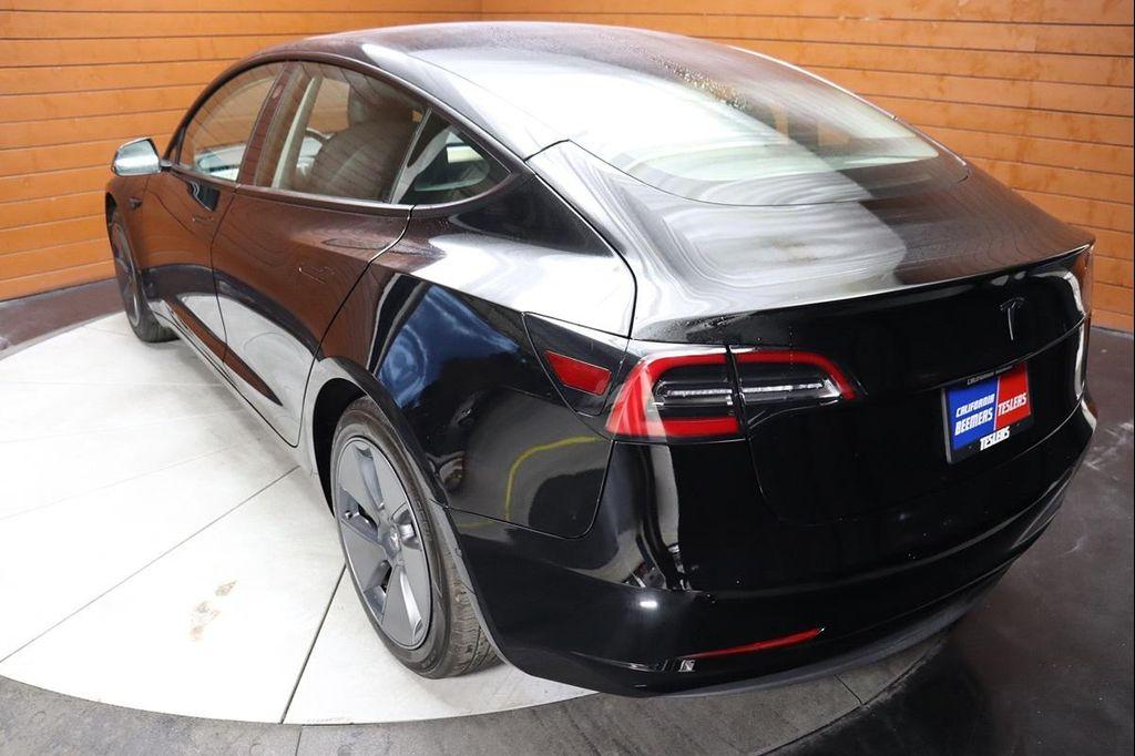 used 2023 Tesla Model 3 car, priced at $21,999