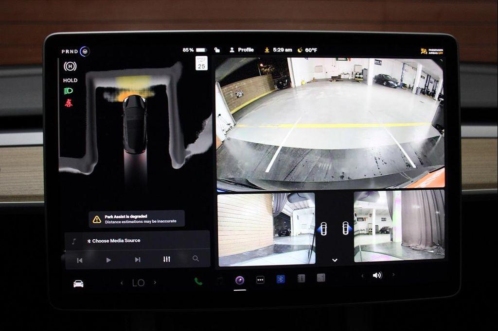 used 2023 Tesla Model 3 car, priced at $21,999