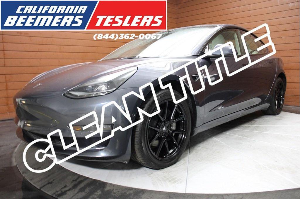 used 2022 Tesla Model 3 car, priced at $26,290