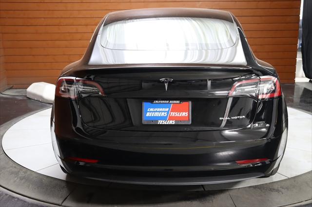 used 2021 Tesla Model 3 car, priced at $27,980