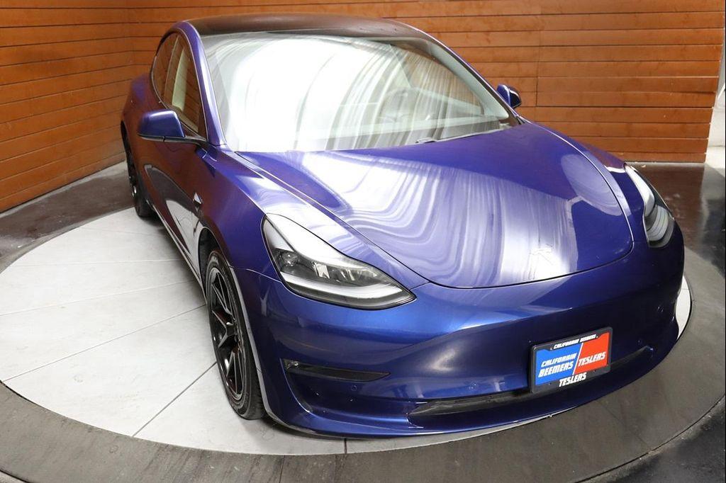 used 2023 Tesla Model 3 car, priced at $25,590
