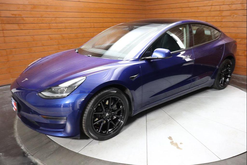 used 2023 Tesla Model 3 car, priced at $25,590
