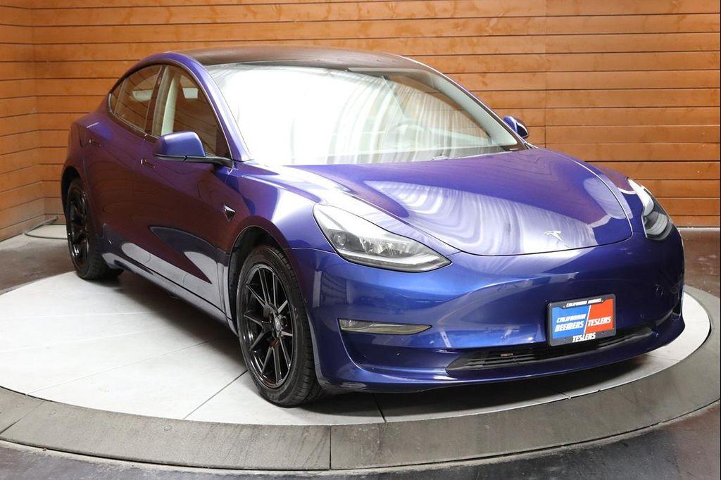 used 2023 Tesla Model 3 car, priced at $25,590