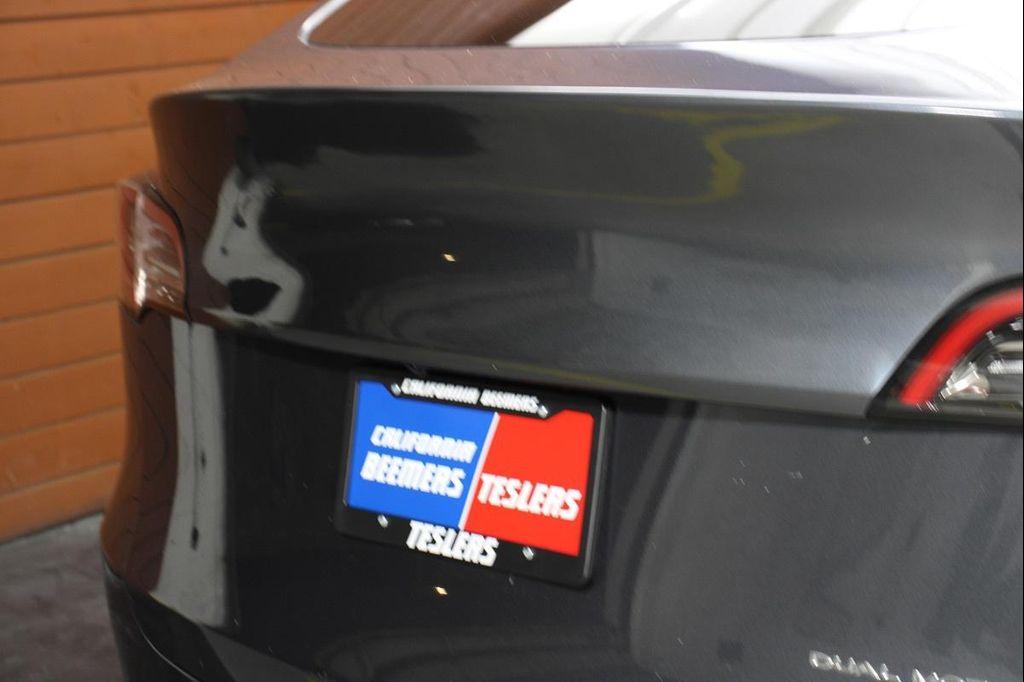 used 2022 Tesla Model Y car, priced at $27,990