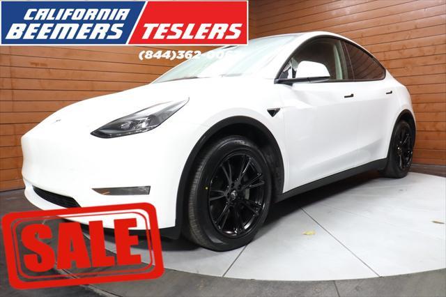 used 2021 Tesla Model Y car, priced at $27,599