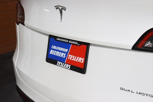 used 2021 Tesla Model Y car, priced at $25,490