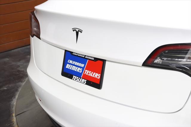 used 2021 Tesla Model 3 car, priced at $20,999