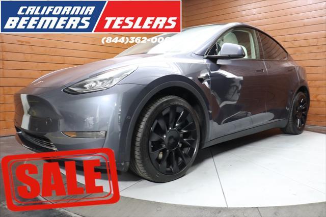 used 2021 Tesla Model Y car, priced at $29,290