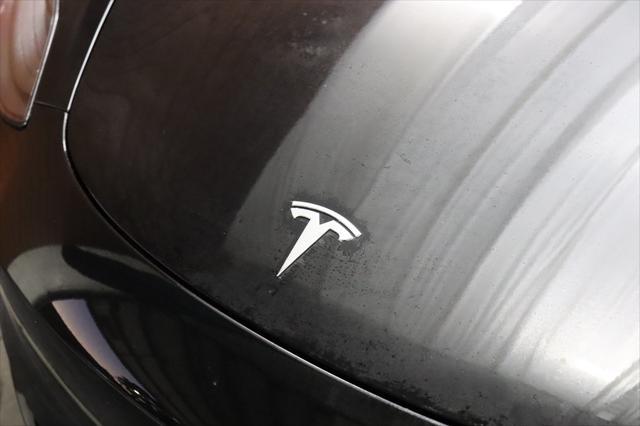 used 2023 Tesla Model 3 car, priced at $28,990