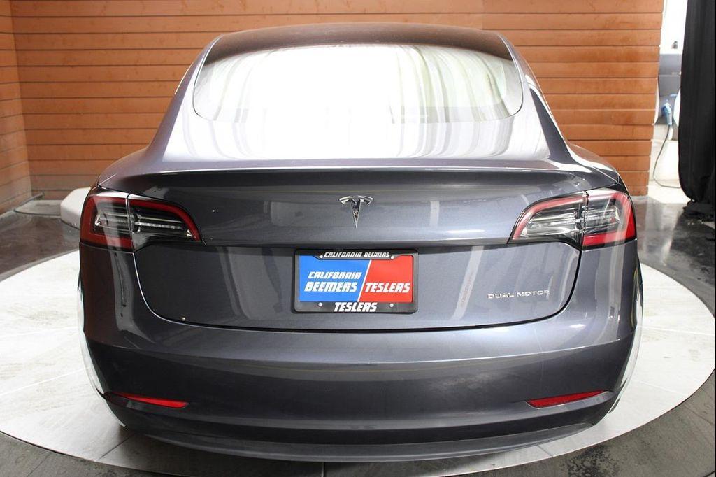 used 2023 Tesla Model 3 car, priced at $25,990