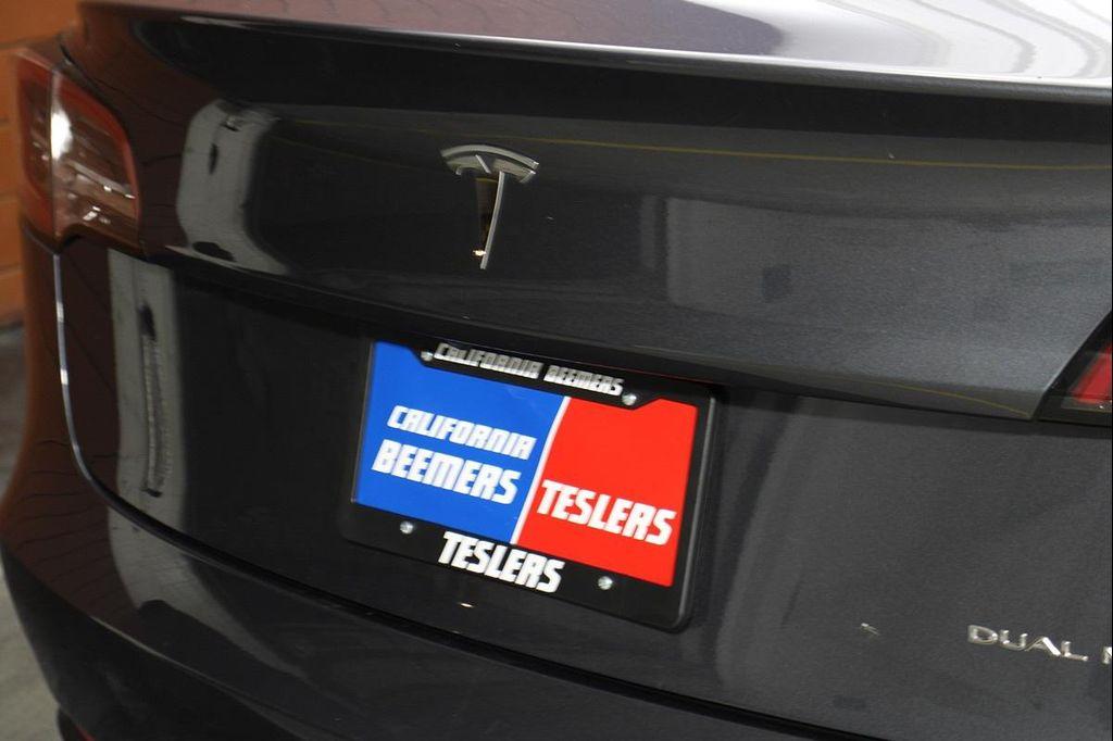 used 2023 Tesla Model 3 car, priced at $25,990