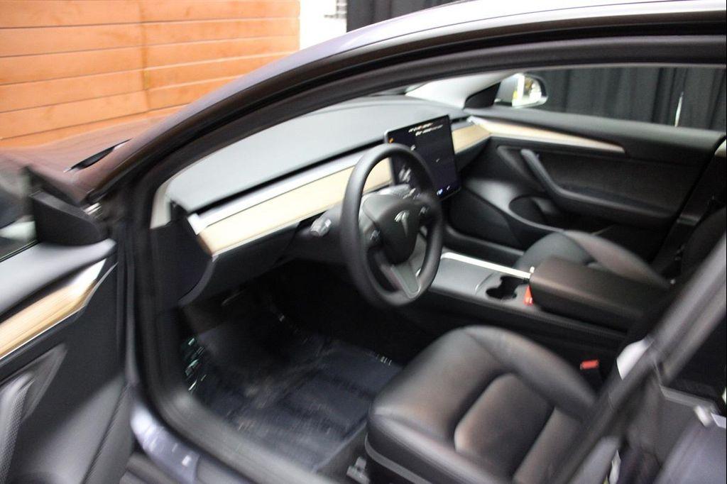 used 2023 Tesla Model 3 car, priced at $25,990