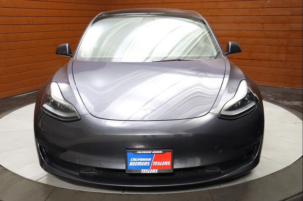 used 2023 Tesla Model 3 car, priced at $25,990