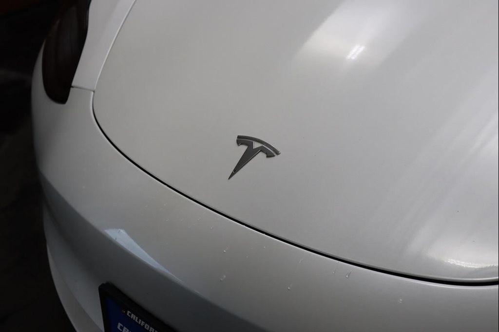 used 2023 Tesla Model 3 car, priced at $20,990