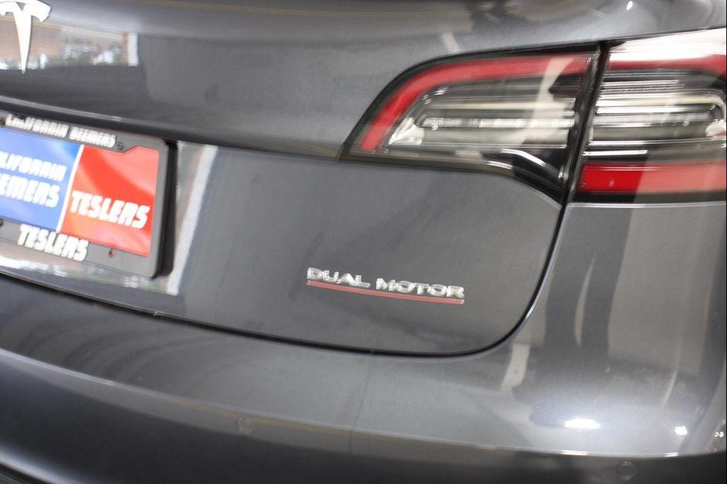used 2022 Tesla Model 3 car, priced at $26,499