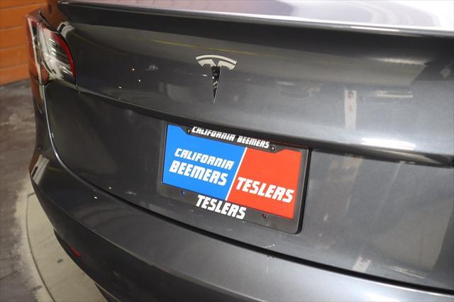 used 2023 Tesla Model 3 car, priced at $25,990