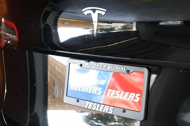 used 2021 Tesla Model Y car, priced at $26,990