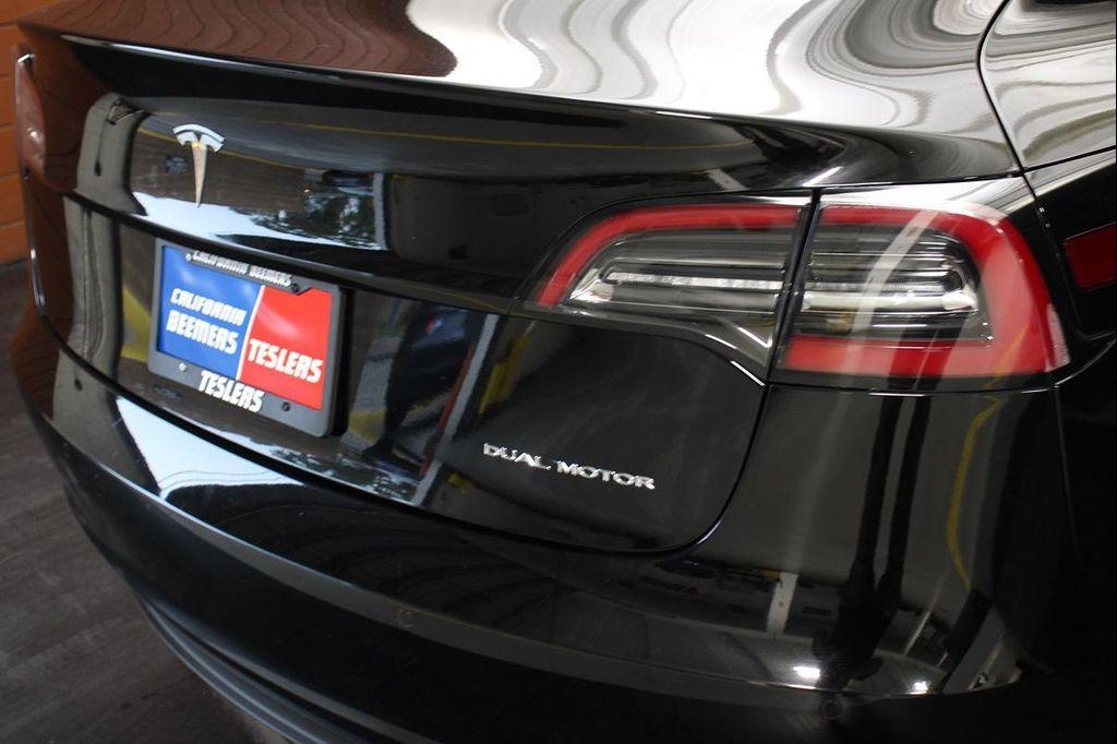 used 2022 Tesla Model 3 car, priced at $26,190