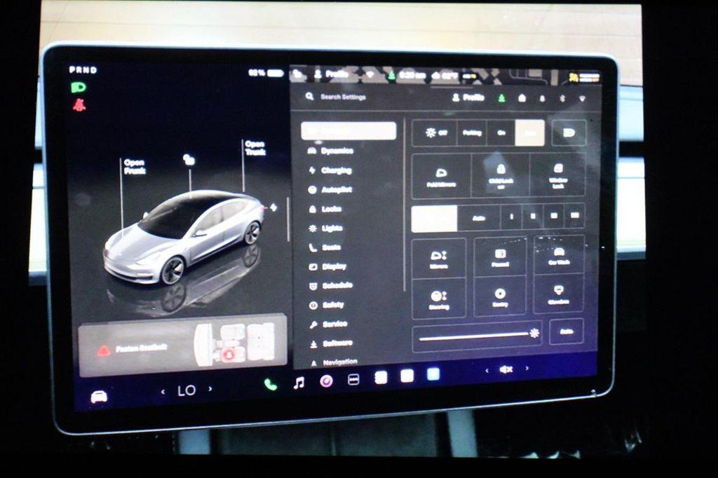 used 2023 Tesla Model 3 car, priced at $21,990