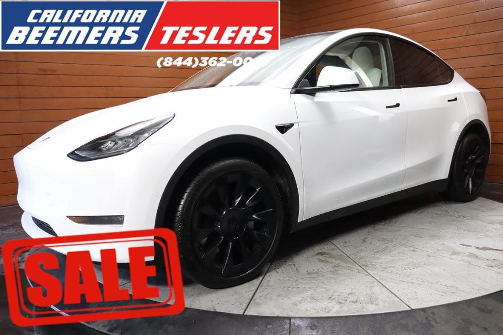 used 2021 Tesla Model Y car, priced at $33,590