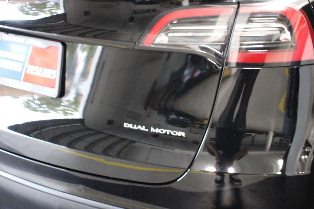 used 2022 Tesla Model Y car, priced at $28,490