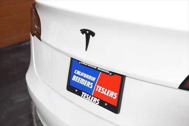used 2023 Tesla Model 3 car, priced at $25,590