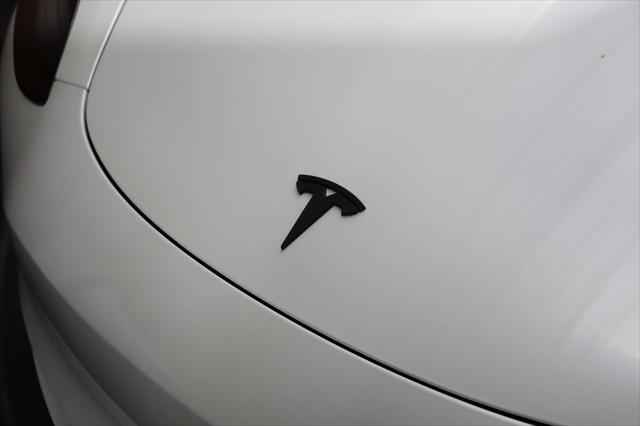 used 2023 Tesla Model 3 car, priced at $25,590