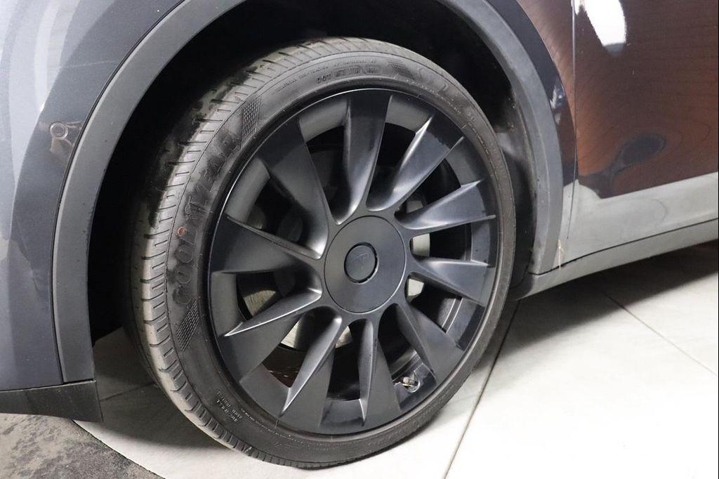 used 2024 Tesla Model Y car, priced at $32,990