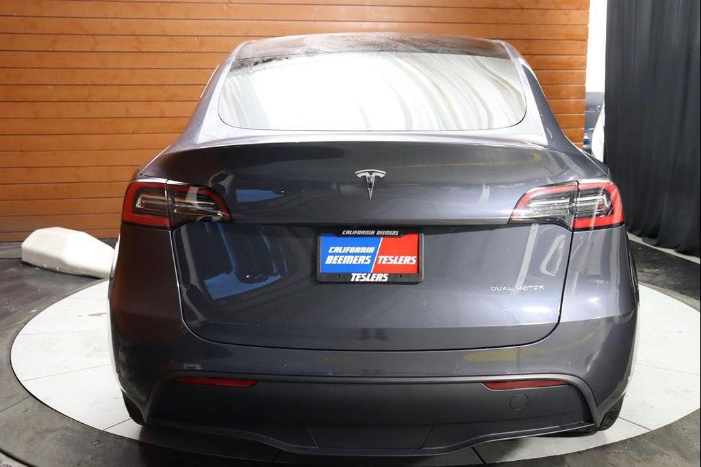 used 2024 Tesla Model Y car, priced at $32,990
