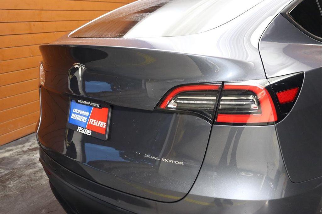 used 2024 Tesla Model Y car, priced at $32,990