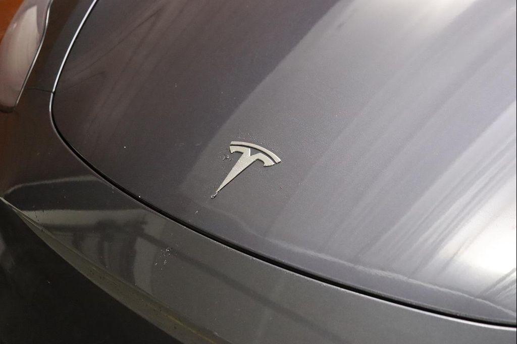 used 2024 Tesla Model Y car, priced at $32,990