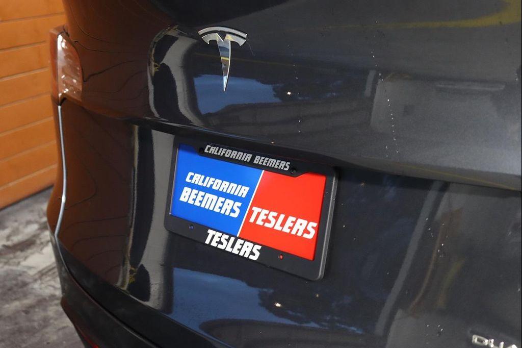 used 2024 Tesla Model Y car, priced at $32,990