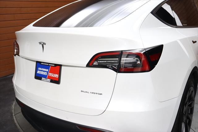 used 2021 Tesla Model Y car, priced at $28,490