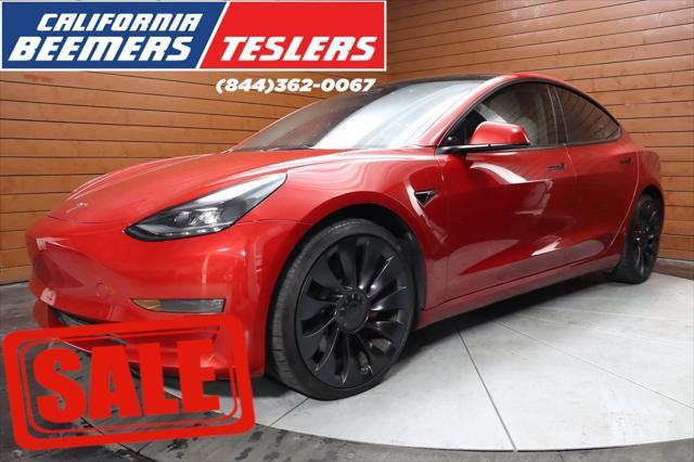 used 2023 Tesla Model 3 car, priced at $30,990