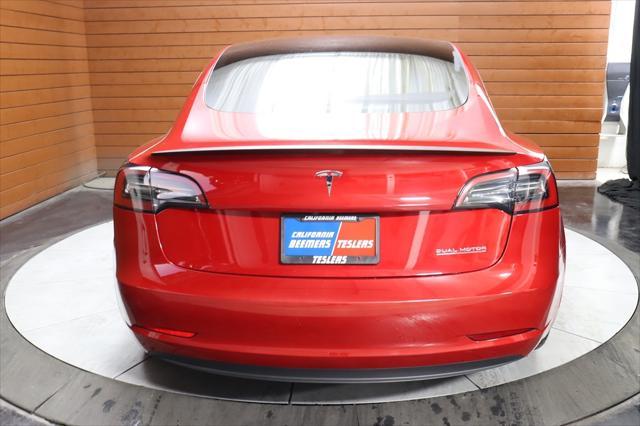 used 2023 Tesla Model 3 car, priced at $30,990