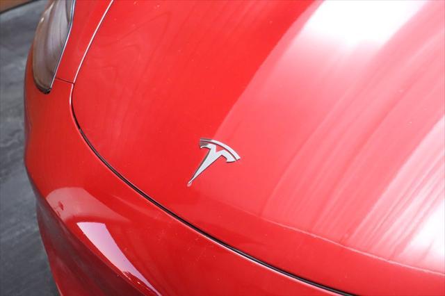 used 2023 Tesla Model 3 car, priced at $30,990