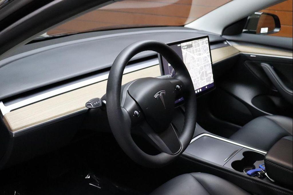 used 2023 Tesla Model 3 car, priced at $21,999