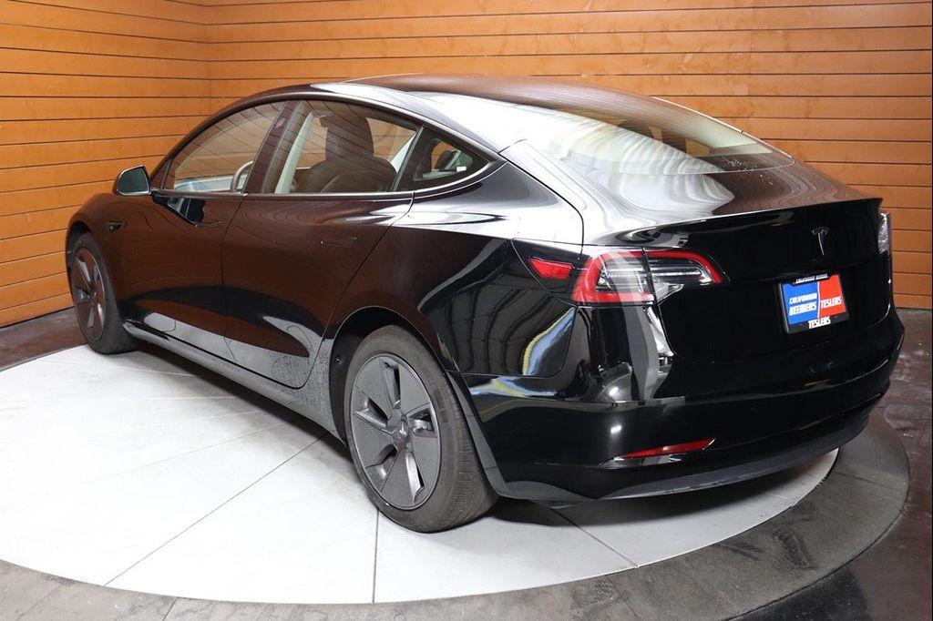 used 2023 Tesla Model 3 car, priced at $21,999