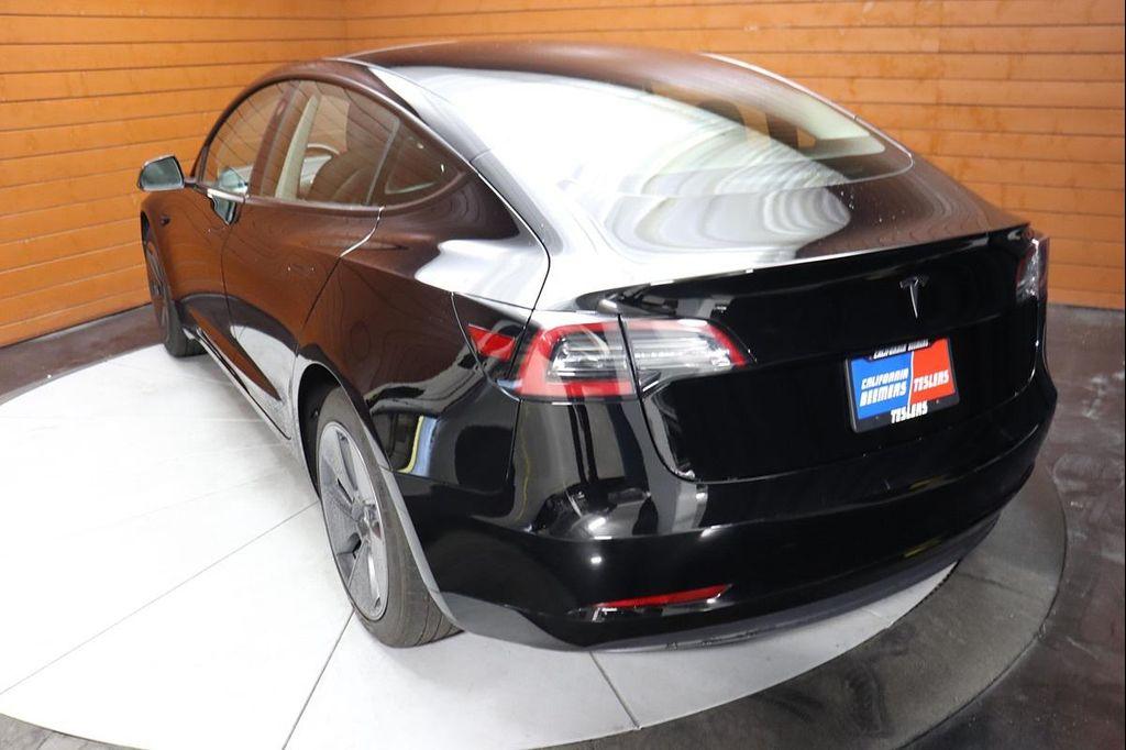 used 2023 Tesla Model 3 car, priced at $21,999