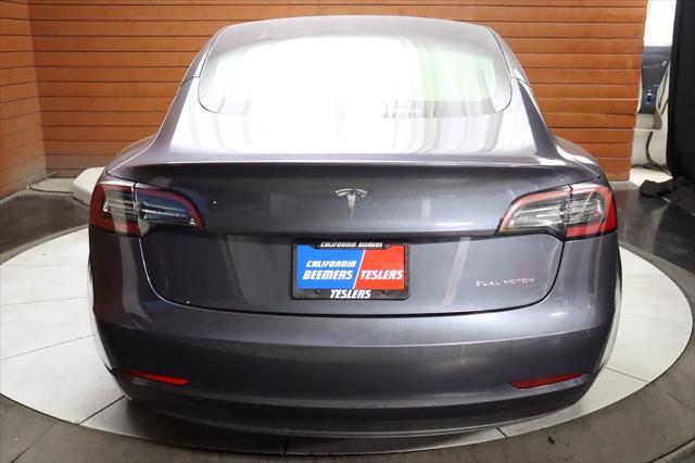 used 2023 Tesla Model 3 car, priced at $28,490