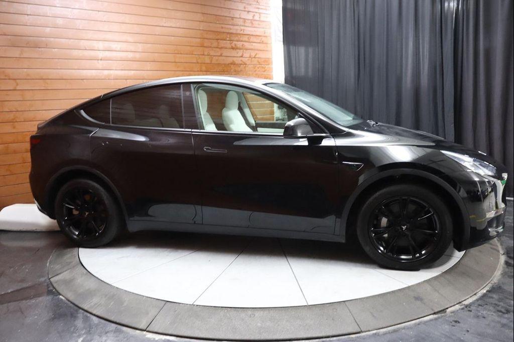 used 2023 Tesla Model Y car, priced at $28,490