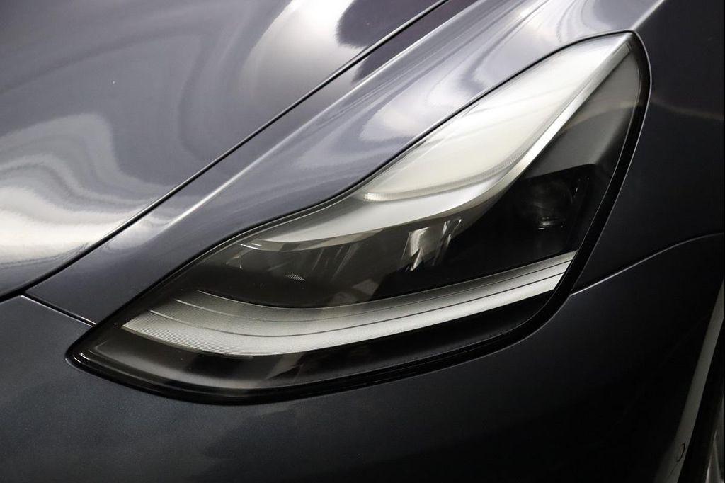 used 2022 Tesla Model 3 car, priced at $27,390