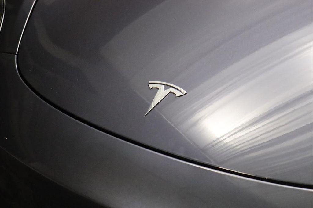 used 2022 Tesla Model 3 car, priced at $27,390