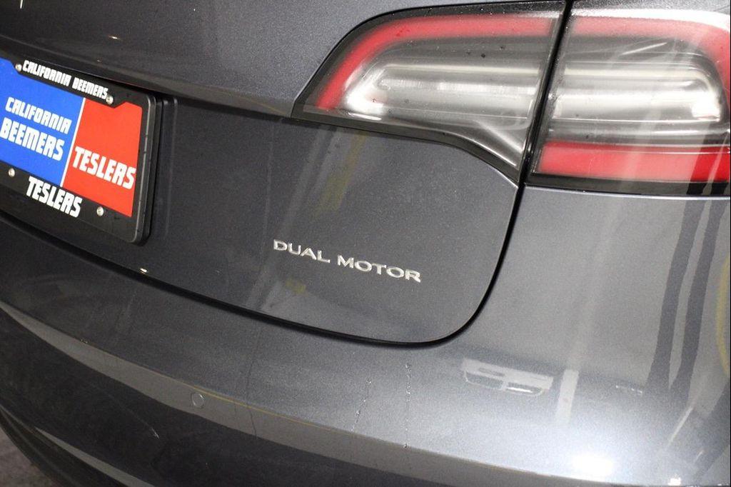 used 2022 Tesla Model 3 car, priced at $27,390