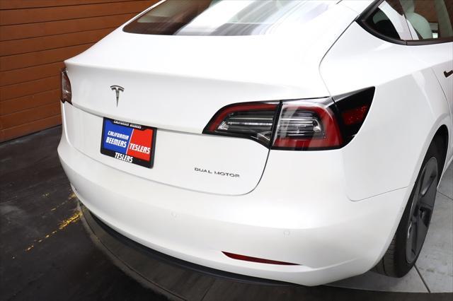 used 2022 Tesla Model 3 car, priced at $27,490