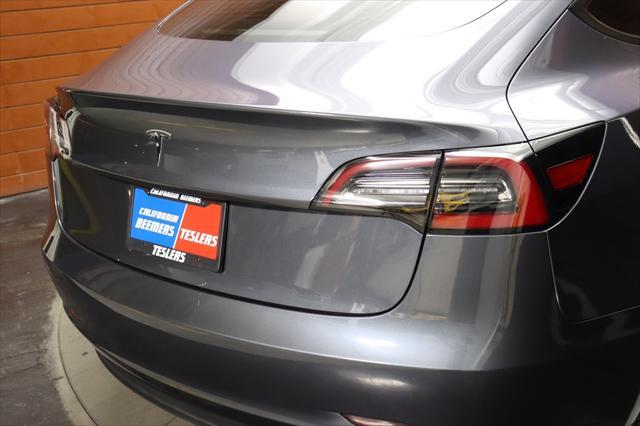 used 2023 Tesla Model 3 car, priced at $25,590